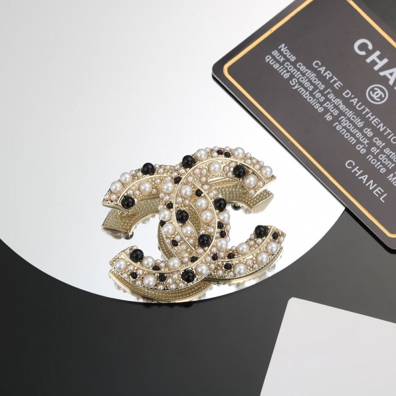 Ch**el brooches